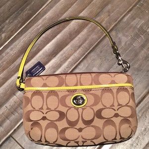 Coach signature print wristlet with patent trim